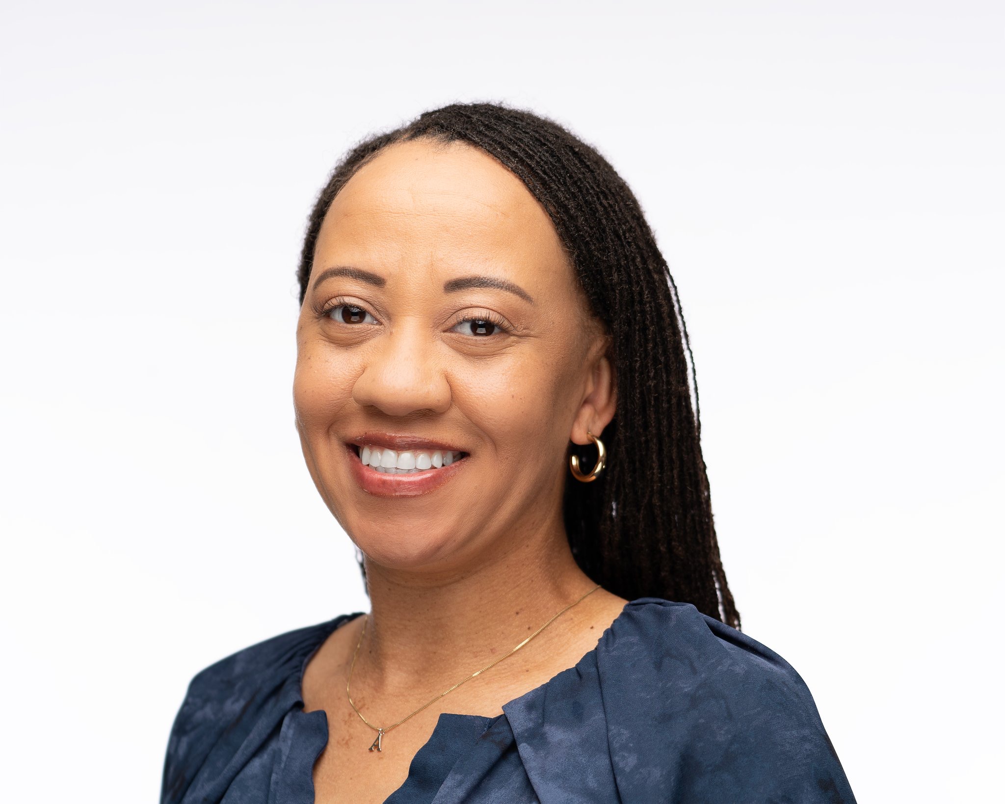 Professional headshot of Dr. Alexes M. Terry